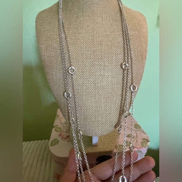 Elegant Silver Layered Necklace with Circular Accents - Picture 4 of 7